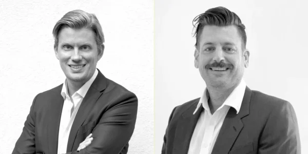 Black-white portraits of Per Martinsson and Brenton Melville from Avinode Group